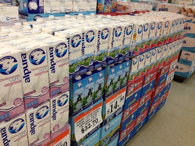 Milk stacked in the aisles of the supermarket