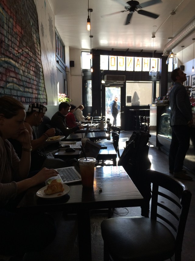 Working in the coffee shop.