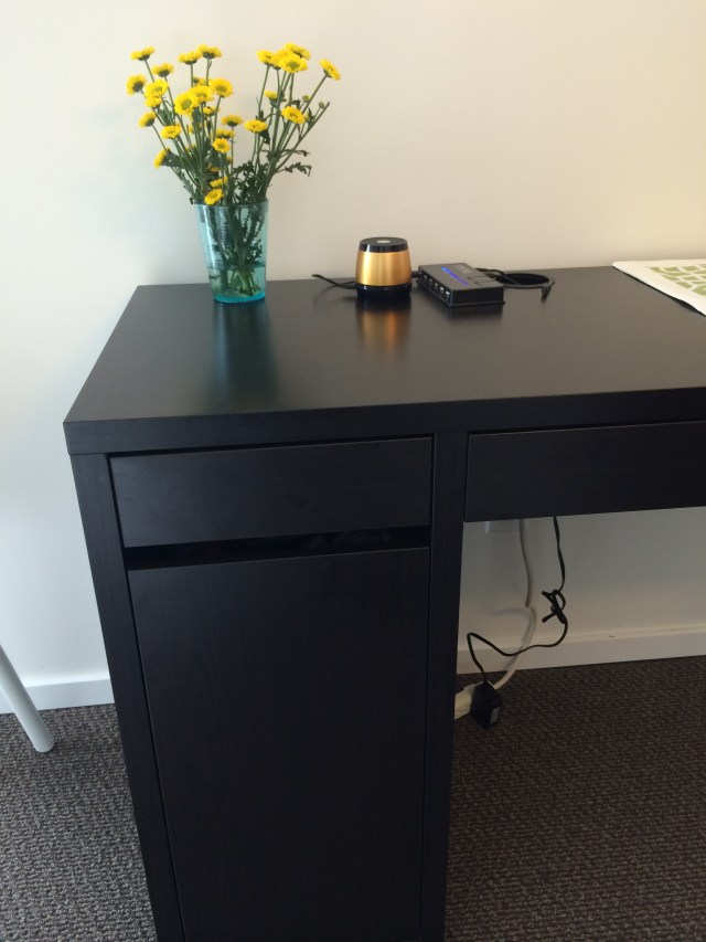 The cupboard in this desk serves as my pantry.