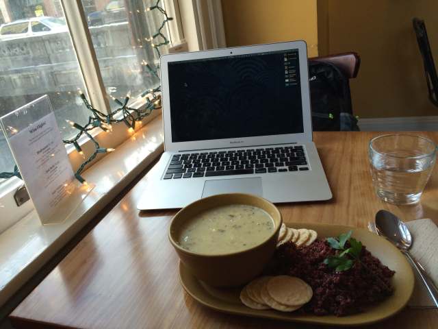 Laptop and food in North Branch Cafe.