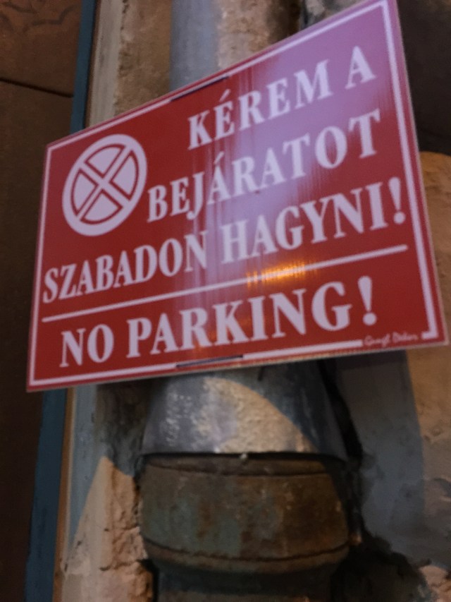 Sign with exclamation points.